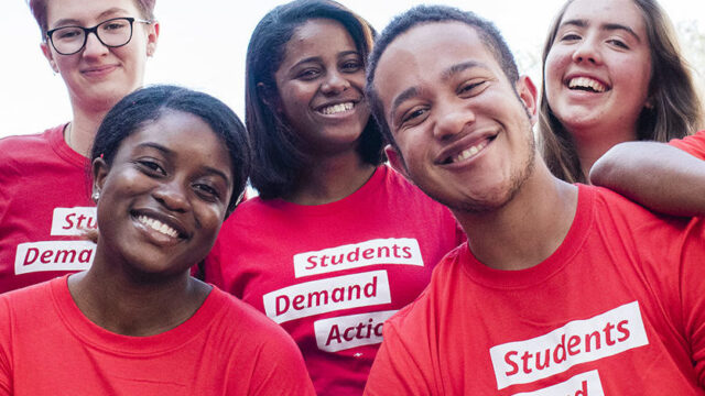 Five Students Demand Action volunteers smile in a group photo