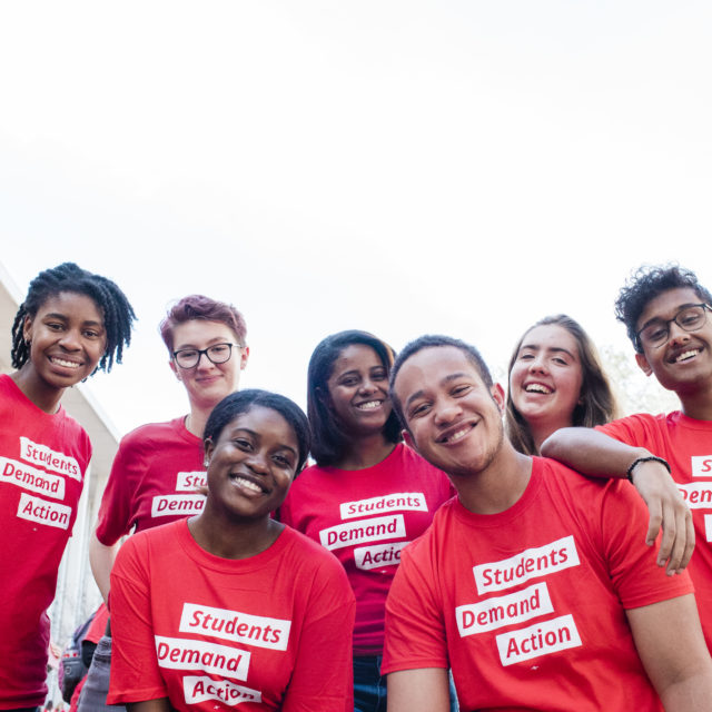 Group photo of seven smiling Students Demand Action volunteers