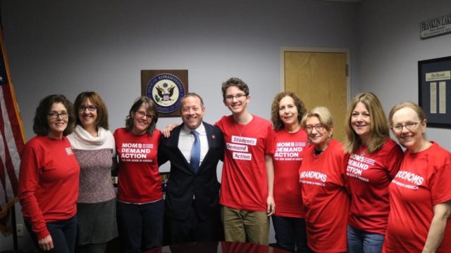 Laurence Fine and members of Moms Demand Action attend a meeting