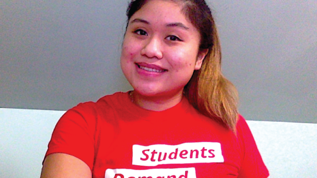 Kathy P. wears a Students Demand Action shirt