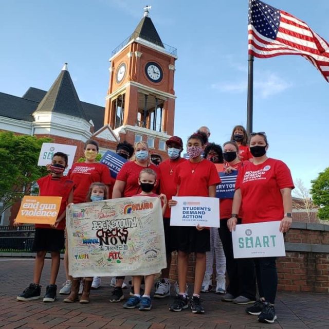 A group of volunteers in Dallas, GA on the Road Trip for Background Checks