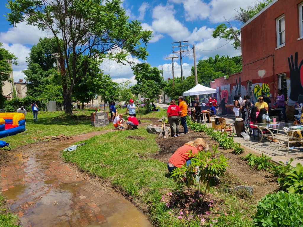 People work on a gardening/greening project