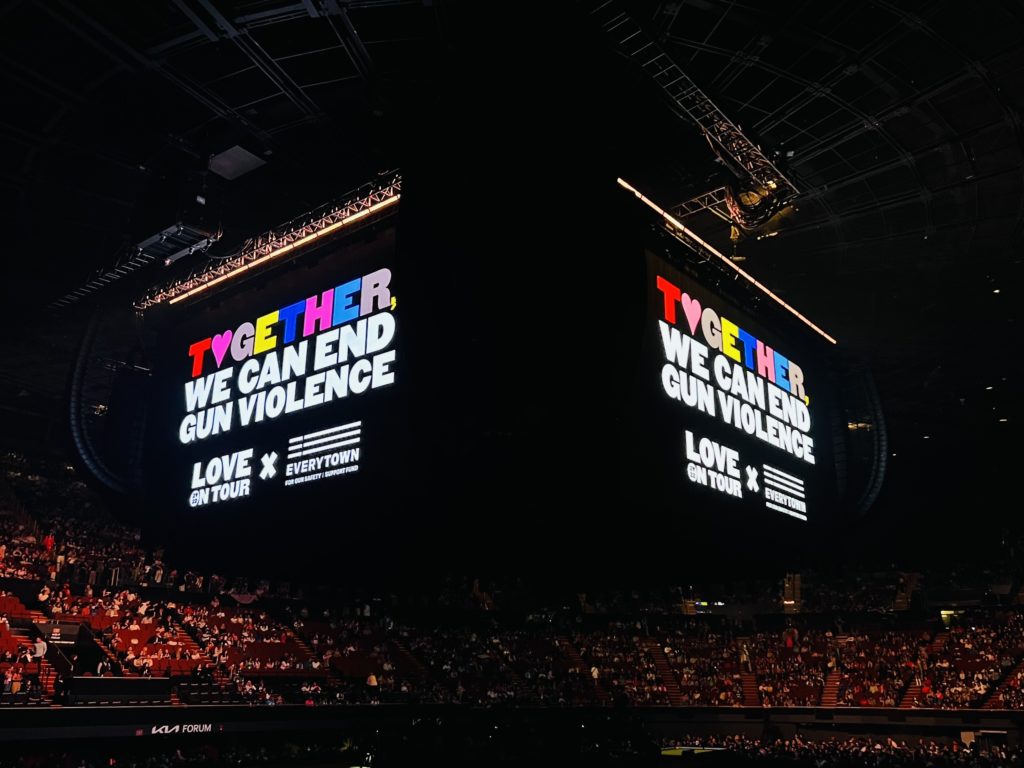 Love on Tour jumbotron message: Together, We Can End Gun Violence