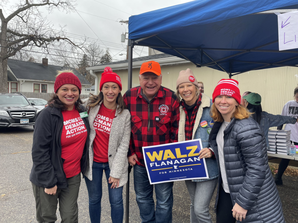 Moms Demand Action volunteers pose for a photo campaigning for Walz Flanagan for Minnesota