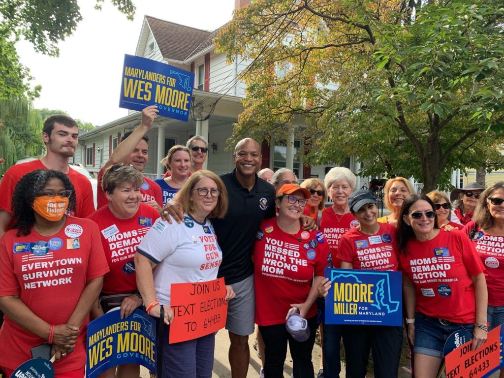 Moms Demand Action volunteers pose for a photo campaigning for Wes Moore for Maryland